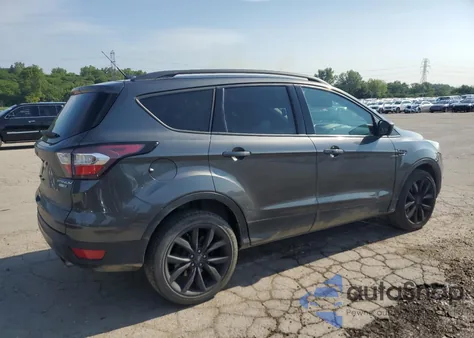 2017 Ford Escape Titanium z USA, uszkodzony, nr VIN 1FMCU9J99HUE93325